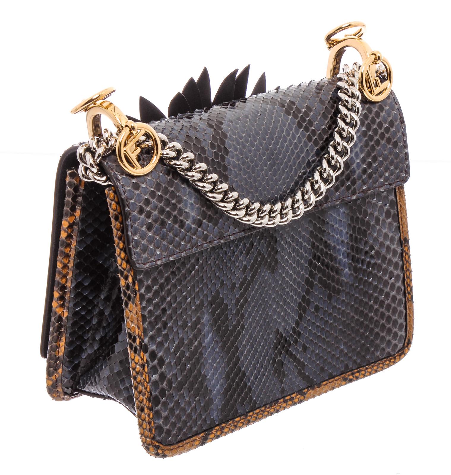 Black snakeskin Fendi Kan I micro bag with gold-tone hardware, narrow shoulder strap, brown and multicolor snakeskin floral appliqué at front featuring logo adornment, tonal suede interior, single slit pocket at interior and dual magnetic snap