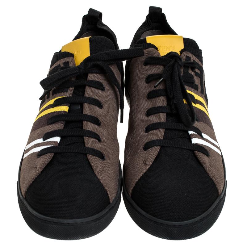 Refuse to compromise comfort with style and opt for this pair from Fendi as they've been purposely built to help you look stylish and ease your feet. Crafted from stretchable knit fabric, the sneakers carry a low top design and a feature a striped