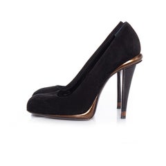 Fendi, black suede and bronze pump.