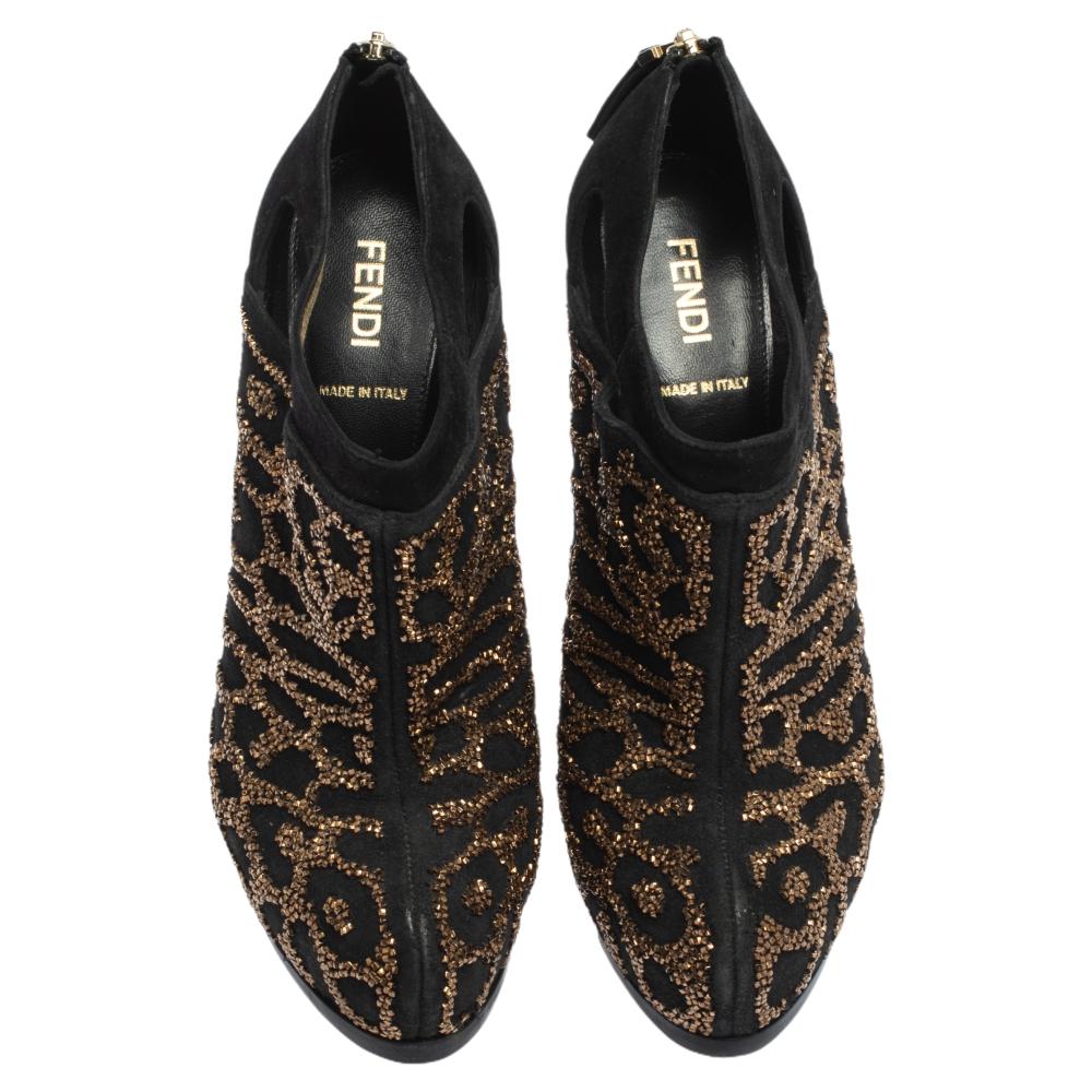You are sure to stun onlookers with these booties from Fendi as they're absolutely gorgeous! Meticulously crafted from suede, they come in black and are embellished with crystals to form an animal pattern. along with zip closures, leather-lined