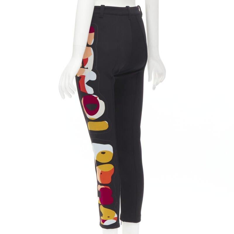 FENDI black thick wool Fendi Roma print cropped tight pants XS
Reference: ANWU/A00441
Brand: Fendi
Material: Wool
Color: Black, Orange
Pattern: Solid
Closure: Zip
Extra Details: Gunmetal FENDI metal charm at waist. FENDI ROMA graphic print on left
