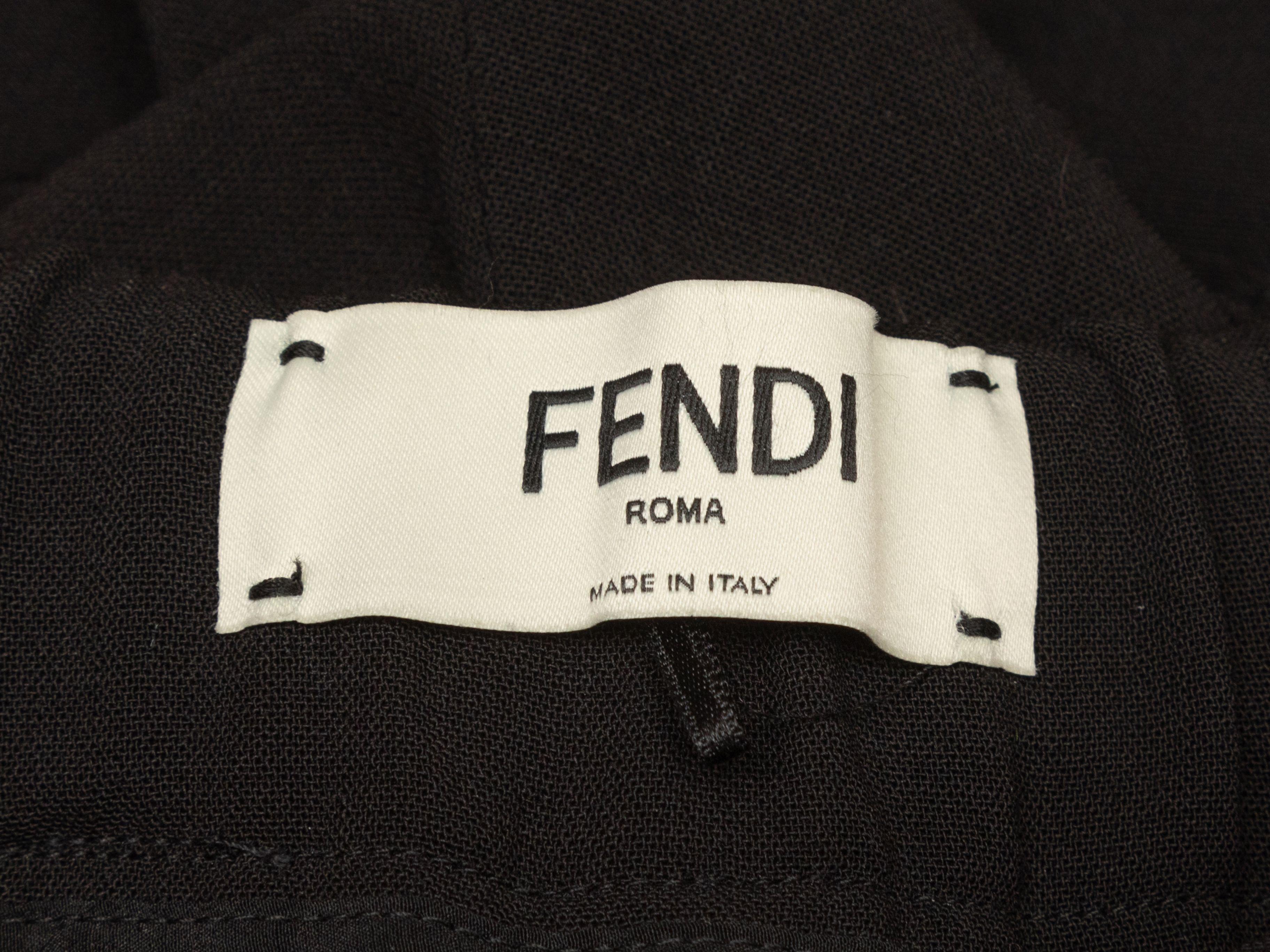 Product Details: Black virgin wool joggers by Fendi. Dual back packets. Drawstring tie closure at waist. Designer size 40. 30