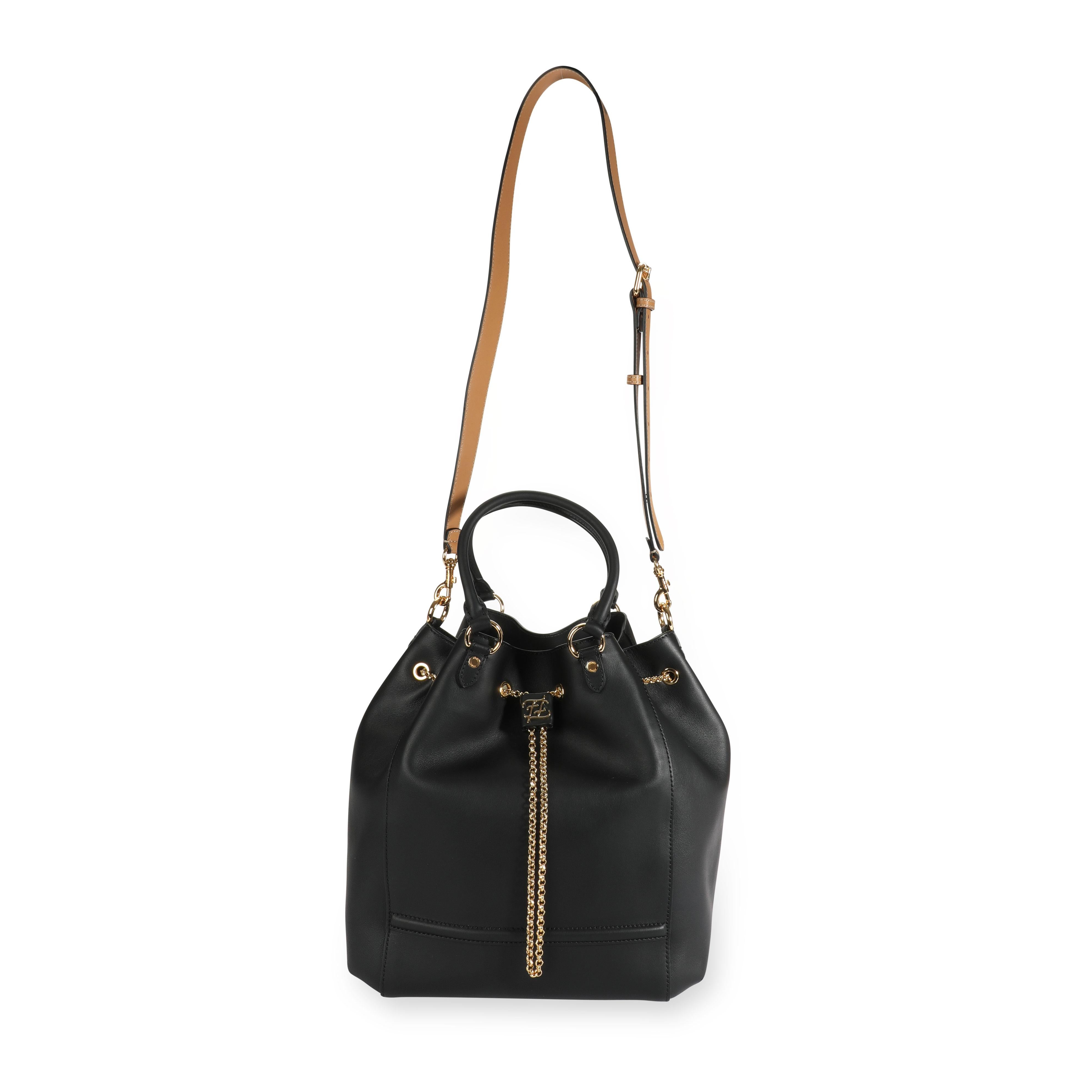 Fendi Black Vitello Leather Karligraphy Chain Bucket Bag
SKU: 109671
MSRP: 3190.00
Condition: Pre-owned (3000)
Handbag Condition: Excellent
Condition Comments: Excellent Condition. Plastic on feet. No visible signs of wear. Final sale.
Brand: