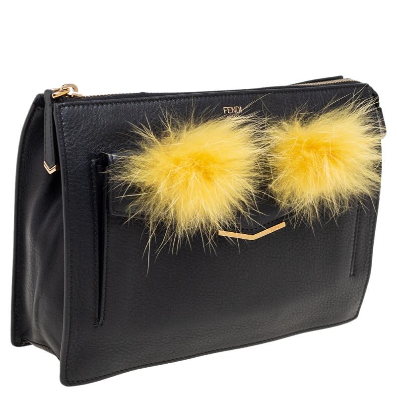 Fendi Monster-Clutch aus schwarzem/gelbem Leder im Zustand „Gut“ in Dubai, Al Qouz 2