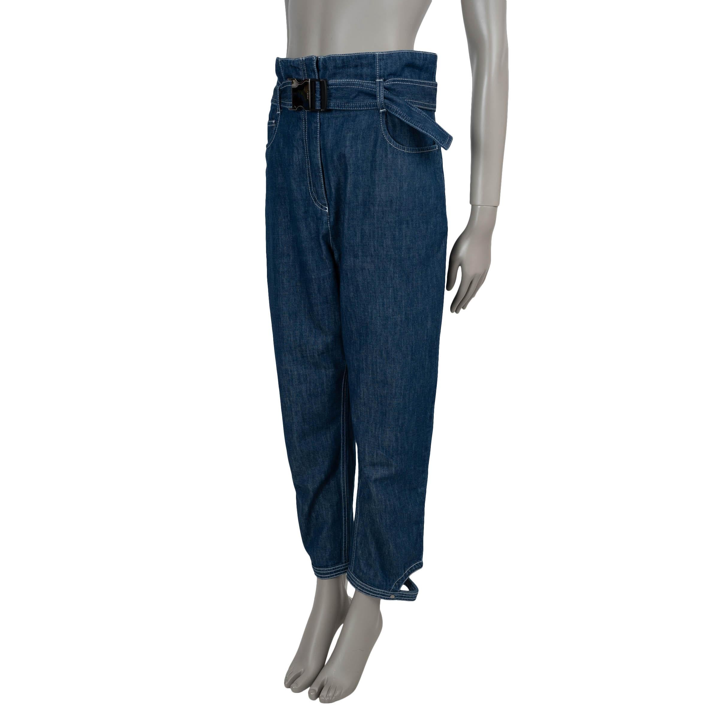 This 100% authentic Fendi jeans in dark blue denim cotton (100%) offer a distinctive blend of structure and style. Featuring a relaxed silhouette with a paperboy waist and tapered legs, they’re finished with unique cut-out details at the ankles for