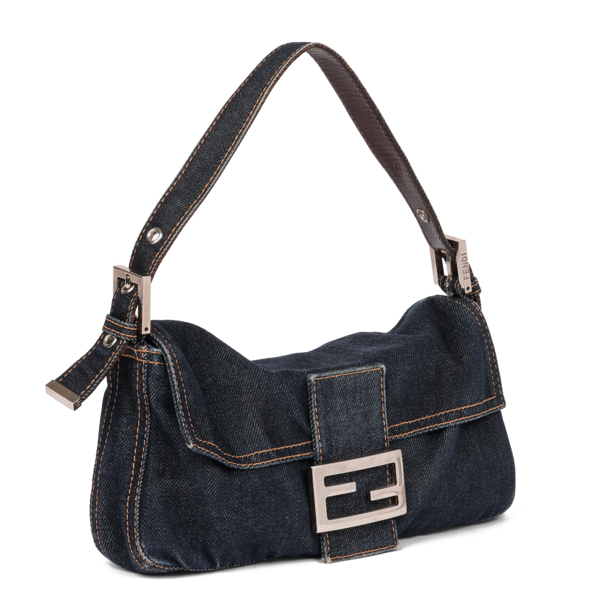 FENDI
Blue Denim & Brown Calfskin Leather Vintage Baguette

Xupes Reference: HB5139
Serial Number: 2308-26424-093
Age (Circa): 2000
Authenticity Details: Date Stamp (Made in Italy)
Gender: Ladies
Type: Top Handle, Shoulder

Colour: Blue 
Hardware: