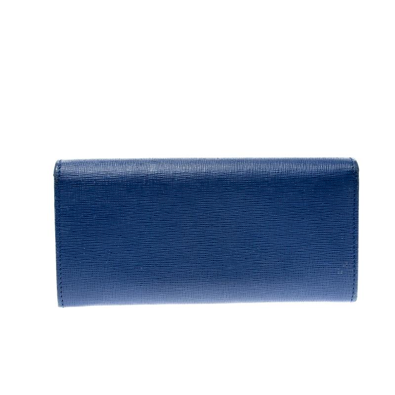 Add the Fendi touch to your everyday accessories by owning this Elite continental wallet! It is made from blue leather and flaunts the brand logo on the front. The interior is lined with leather and has multiple card slots, open compartments and a