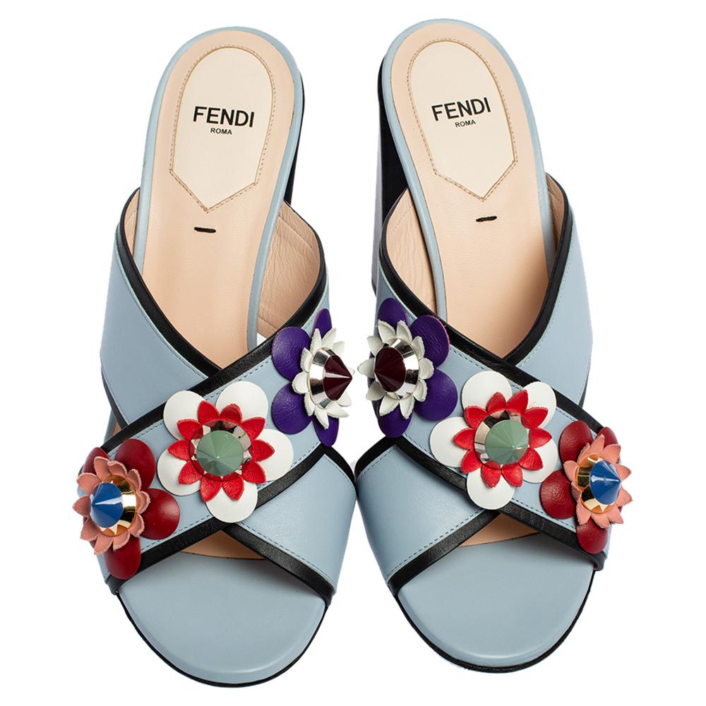 These sandals from Fendi will lend a stylish and playful edge to your feet. These slides are a high-end fashion item that you need to own now. These Flowerland sandals have been crafted from blue leather, they flaunt open toes, cross straps at the