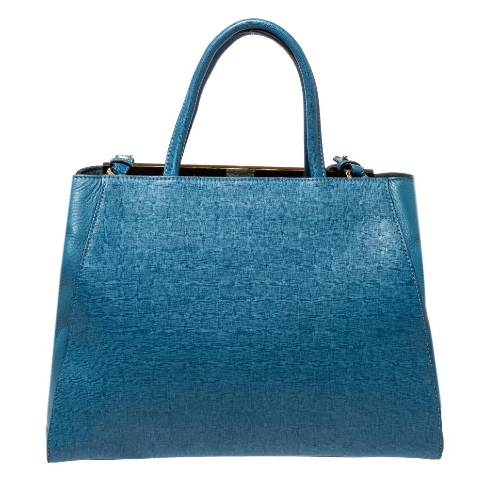 Fendi's 2Jours tote is one of the most iconic designs from the label and it still continues to receive the love of women around the world. Crafted from blue leather, the bag features double rolled handles. It is also equipped with a fabric and suede
