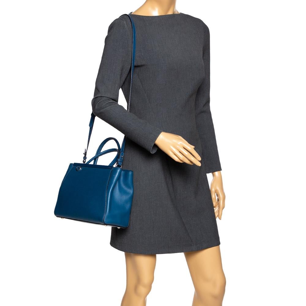Fendi's 2Jours tote is one of the most iconic designs from the label and it still continues to receive the love of women around the world. Crafted from blue-hued leather, the bag features double rolled handles. It is also equipped with a