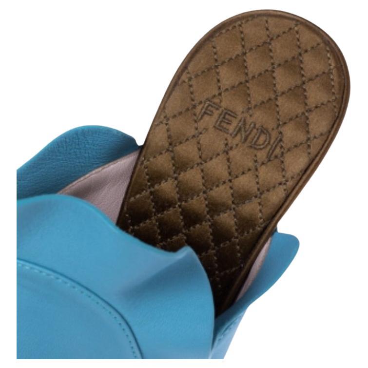The House of Fendi presents these stunning mule sandals. Finely created using blue leather on the exterior, the uniquely carved upper grants these sandals a very exquisite look. In order to provide your feet with a comfortable walking experience,