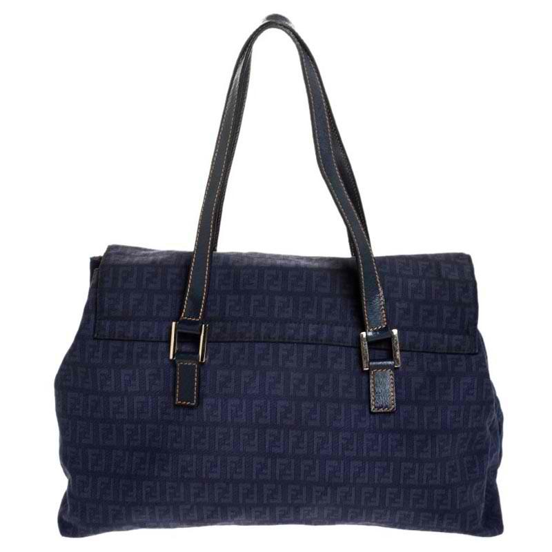 This stunning Forever satchel by Fendi has been designed to deliver style and functionality. Crafted from the brand's signature Zucchino canvas and leather, it comes in a lovely shade of blue. The bag has dual handles, a front flap with the iconic