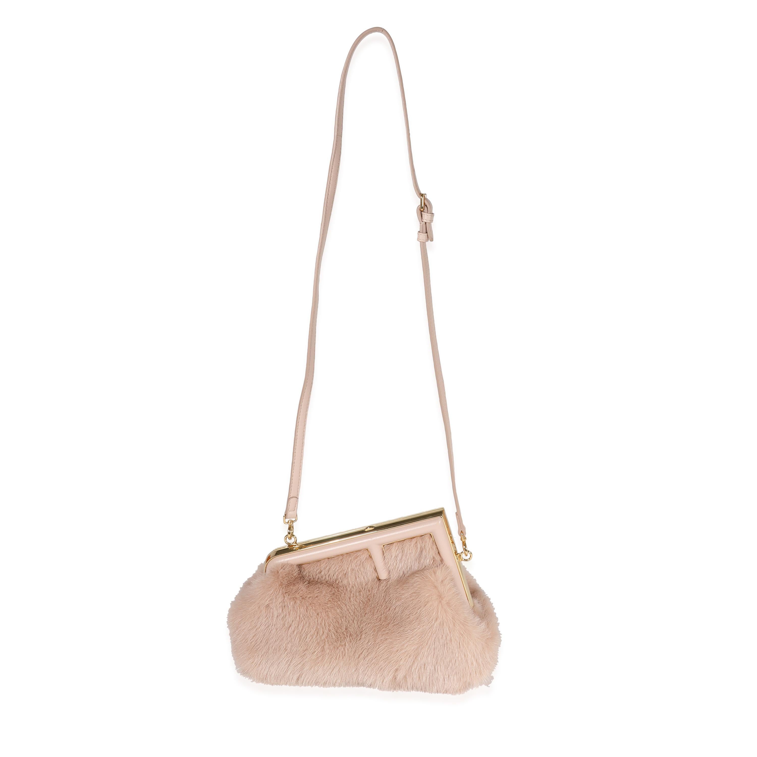 Listing Title: Fendi Blush Mink & Leather Small First Bag
SKU: 122058
MSRP: 5500.00
Condition: Pre-owned 
Handbag Condition: Excellent
Condition Comments: Excellent Condition. Scuff on leather trim. No other visible signs of wear.
Brand: