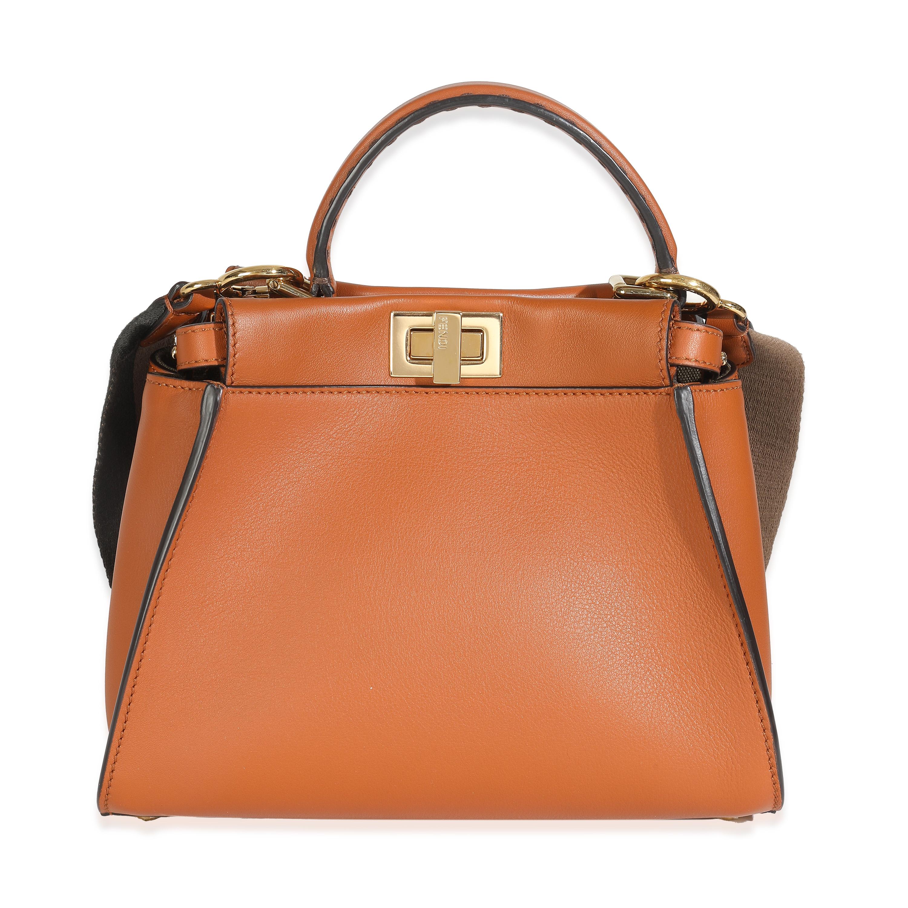 Listing Title : Fendi Brandy Amazzonia Seta Canvas FF Brodée Mini Peekaboo Iconic Satchel
SKU : Z148260
MSRP : 5300.00 USD
Condit : Usagé 
Description de l'article : Le sac fourre-tout Peekaboo IseeYou, à la silhouette structurée, est la réponse de