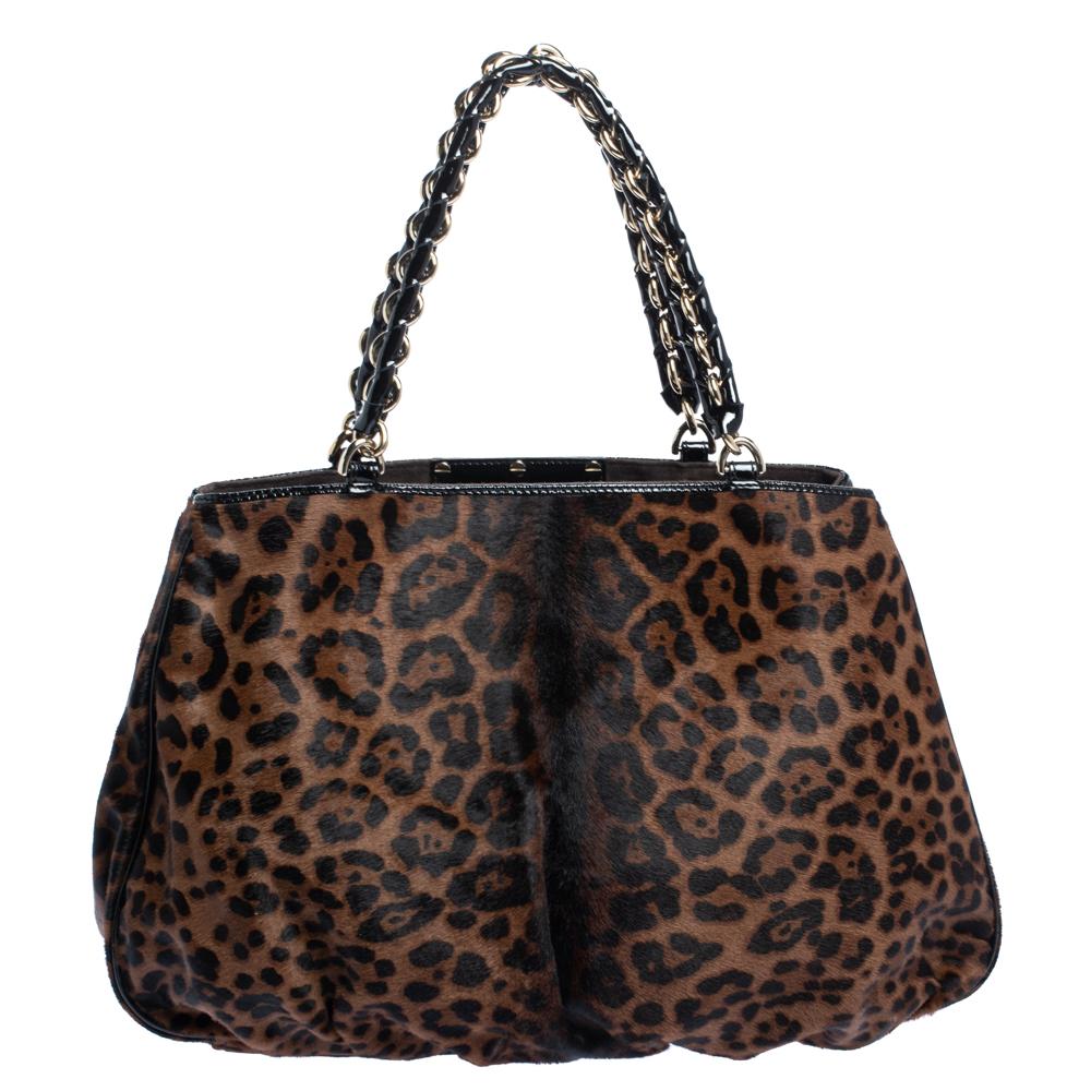 Complete a winning look with this Mia shoulder bag from Fendi. Crafted from leopard-print calfhair, the front comes with a striking gold-tone F logo and the bag reveals a spacious fabric & suede-lined interior that is sure to fit in your everyday