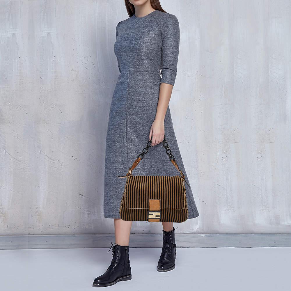 Fendi ensures you have a wonderful accessory to accompany you every day with this well crafted bag. It has a signature look and a practical size.