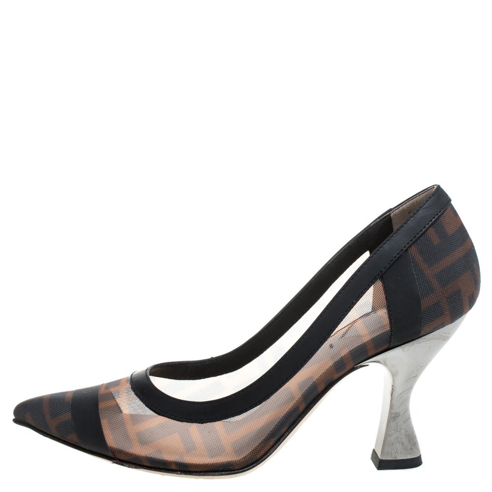 Crafted out of signature Zucca mesh and leather trims, these Fendi pumps are charming enough for you to own them. They feature pointed toes and come endowed with comfortable leather-lined insoles and 8 cm heels.

Includes:Original Dustbag, Original