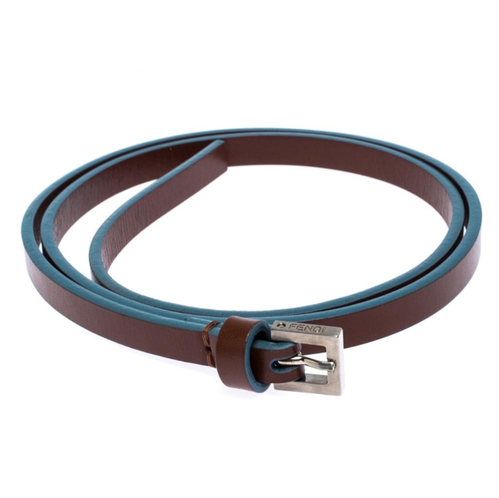 Belts are staple accessories every closet needs to have. This one from Fendi will make a great buy as it is well-crafted and designed to assist your style. It is made from brown and blue leather and detailed with a pin buckle.

Includes: The Luxury