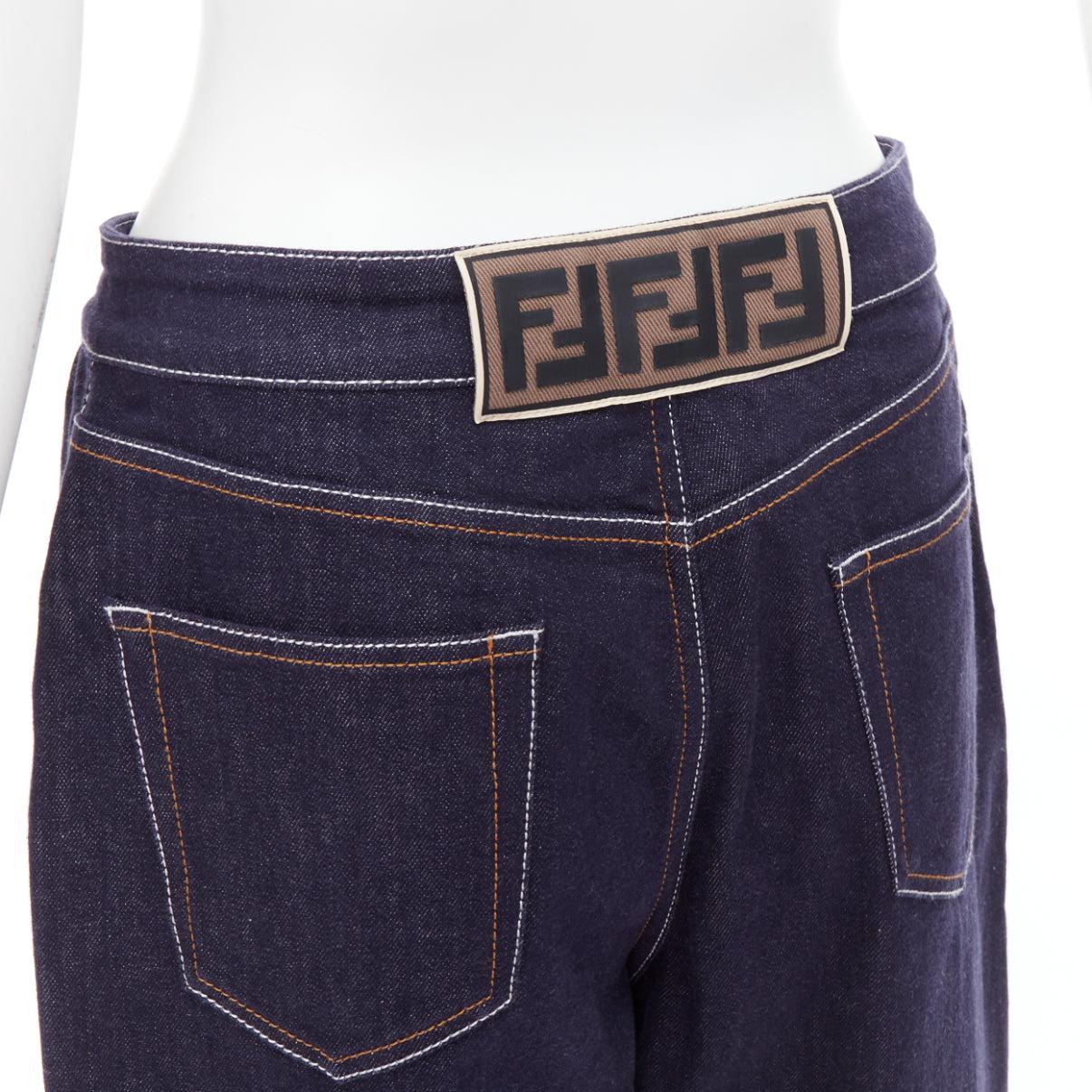 FENDI brown FF logo patch contrast stitch cropped wide leg jeans IT44 L
Reference: KNLM/A00349
Brand: Fendi
Material: Denim
Color: Blue, Brown
Pattern: Monogram
Closure: Zip Fly
Extra Details: FF brown logo patch at back waist.
Made in: