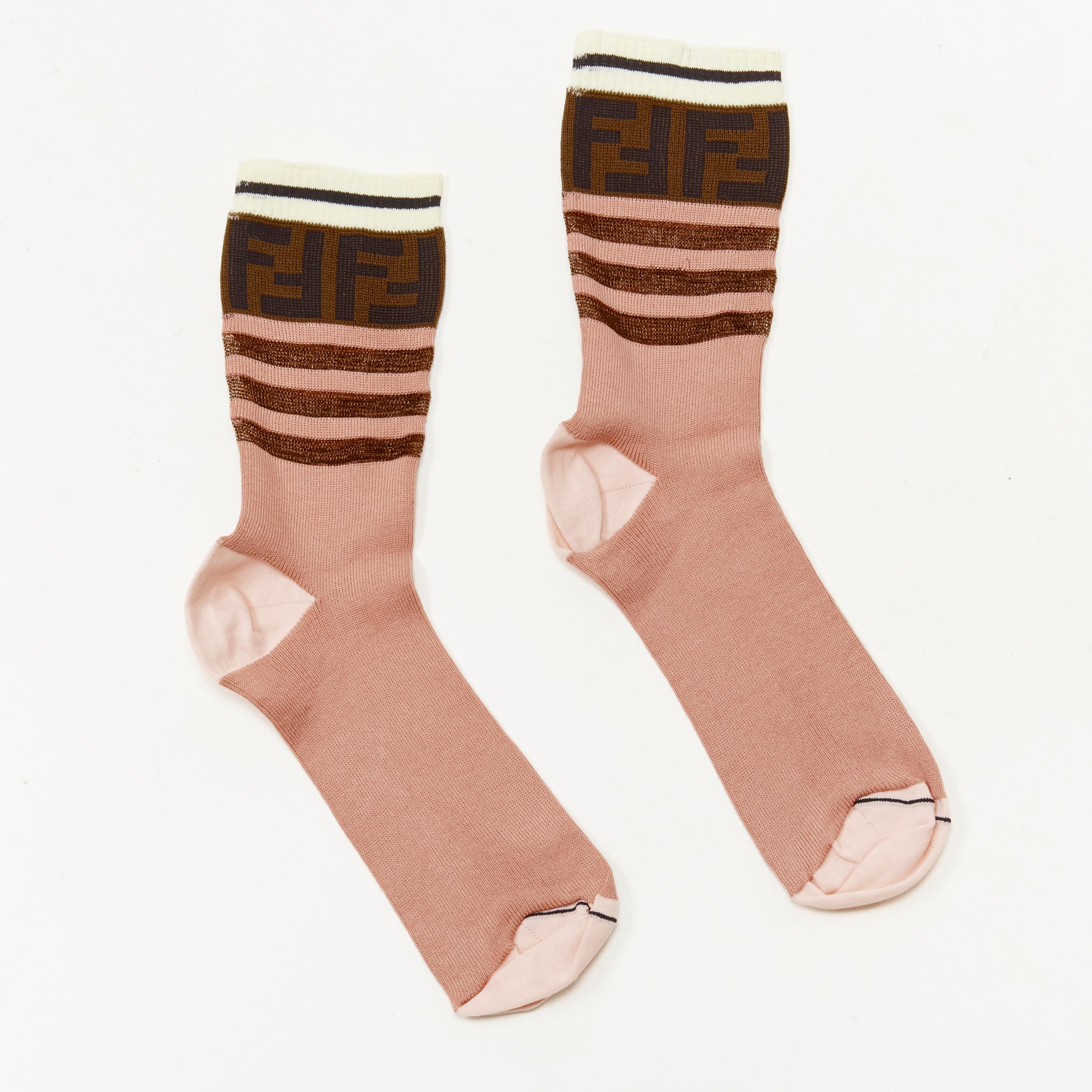 FENDI brown FF Zucca monogram pink striped socks
Brand: Fendi
Color: Pink
Pattern: Solid

CONDITION:
Condition: Excellent, this item was pre-owned and is in excellent condition. 

This Fendi item is authentic. 
