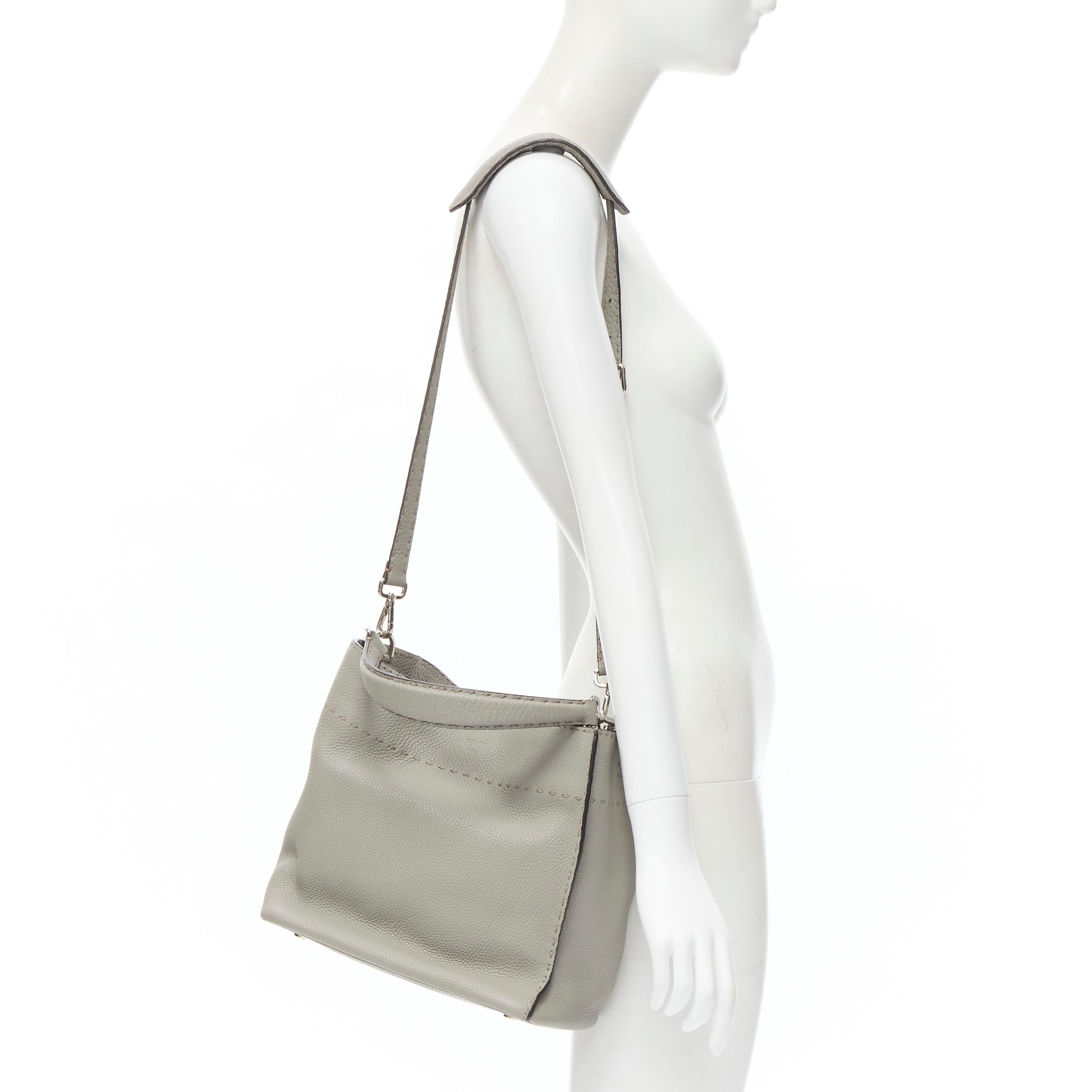 FENDI brown grained leather seller stitch top handle crossbody soft tote bag 
Reference: CELG/A00027 
Brand: Fendi 
Model: Sellier satchel 
Material: Leather 
Color: Grey 
Pattern: Solid Extra Detail: Detachable handle and crossbody strap. Lobster