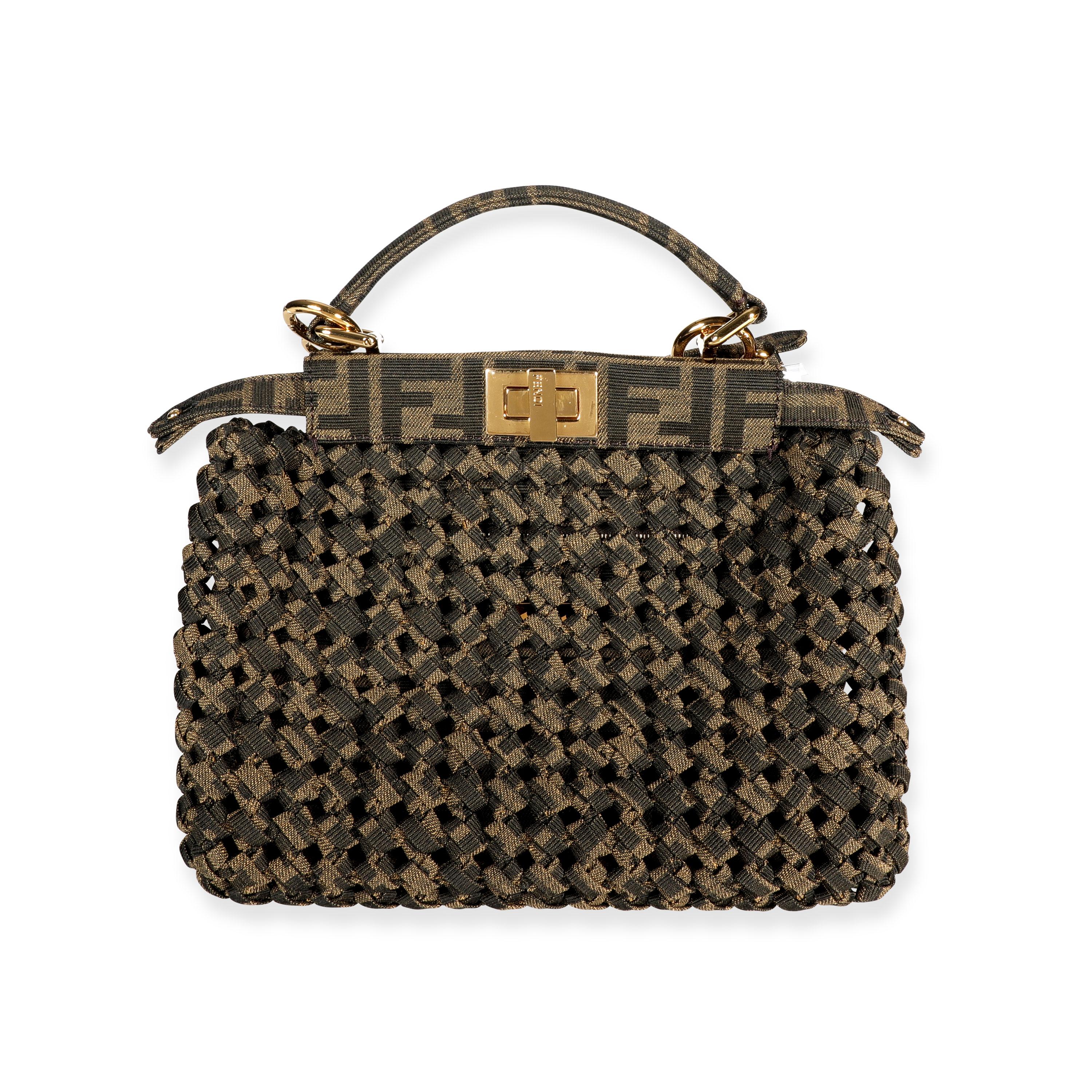 Listing Title: Fendi Brown Jacquard Interlace Iconic Peekaboo Mini Bag
SKU: 107048
MSRP: USD 4,200.00

Condition Description: From the current season, the iconic Peekaboo is crafted in Zucca print jacquard fabric with shiny gold hardware.
Handbag