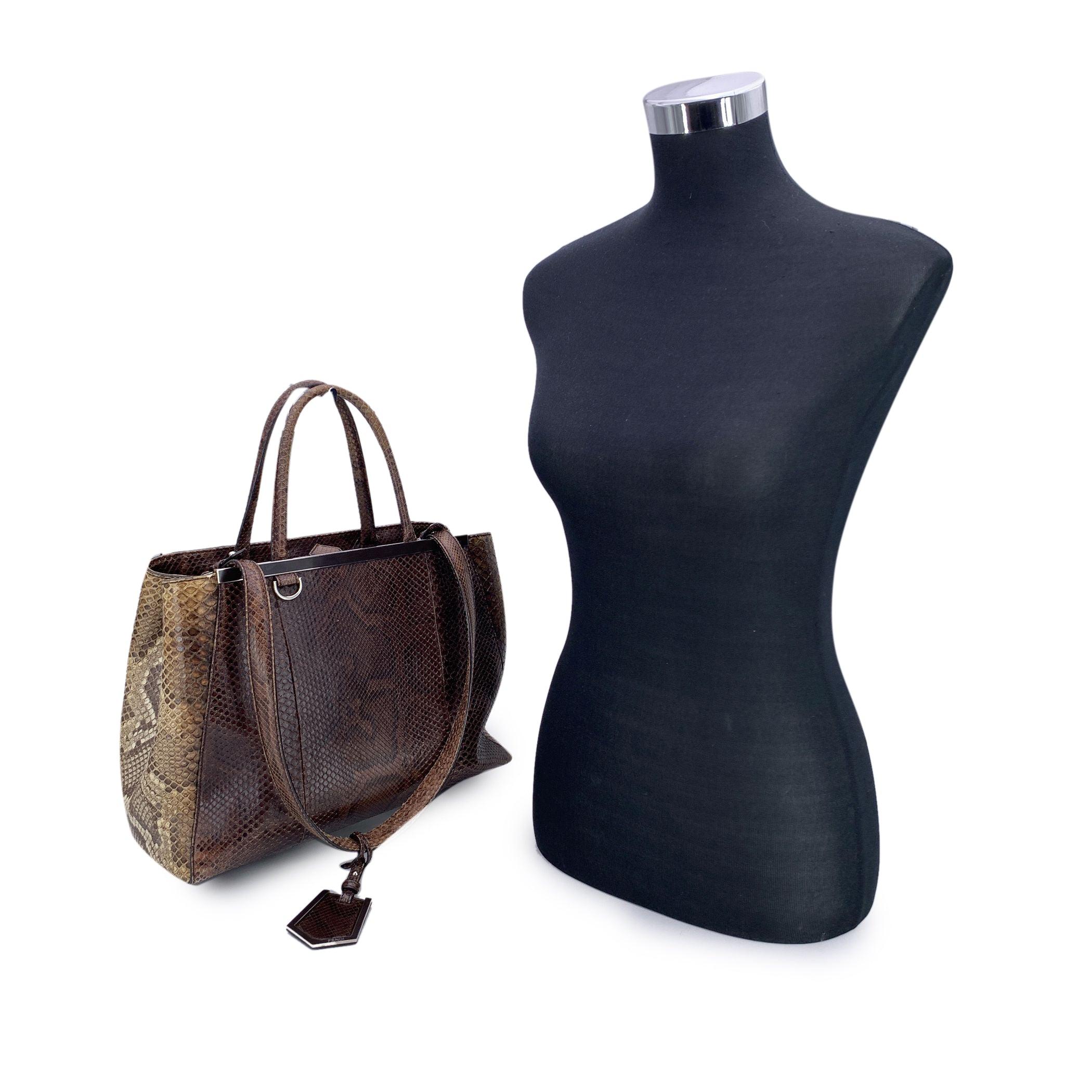 This beautiful item will come with a Certificate of Authenticity provided by Entrupy. The certificate will be provided at no further cost Timelessly refined and unmistakably Fendi, this brown leather 2Jours tote bag captures the structured elegance