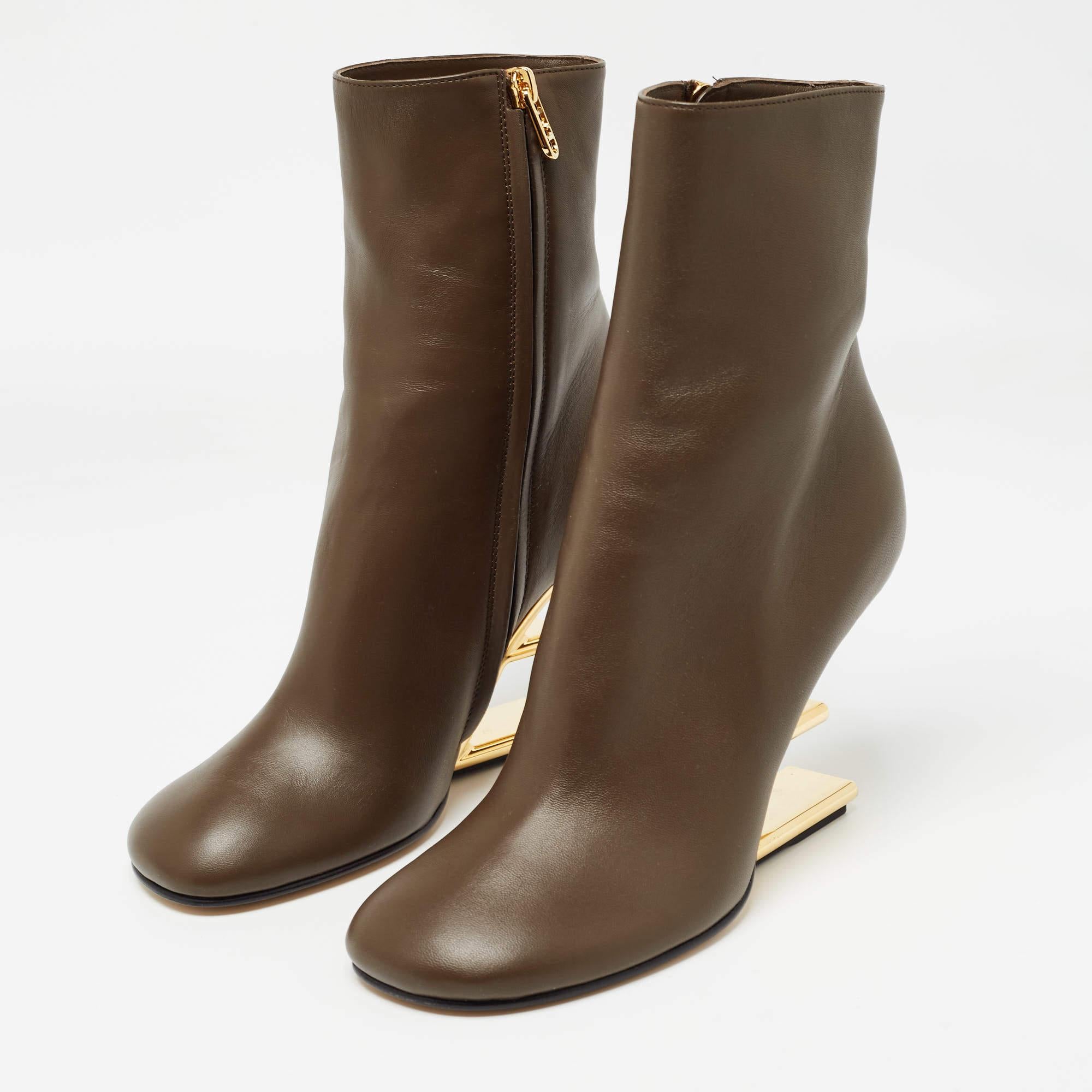 Fendis iconic Fendi First collection certainly requires no introduction. These boots from the Fendi First collection bring eternal charm and luxury to your feet. They are created with the signature diagonal F shaped heels. They showcase an ankle