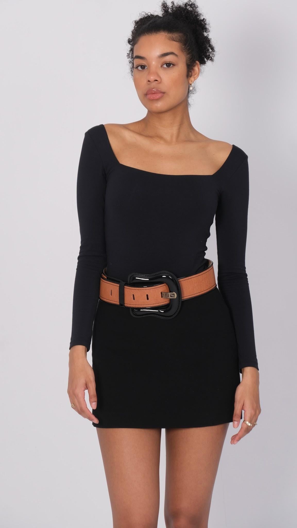 Retail.
Brown leather with patent black trim
Large buckle with logo Zucca FF cutouts on hardware
Model: 8C0303
Size: 34 inch / 85 cm
Made in Italy

Measurements~
Width 1.5”

Comes with generic dust bag.
Very good condition. Light marks to leather.