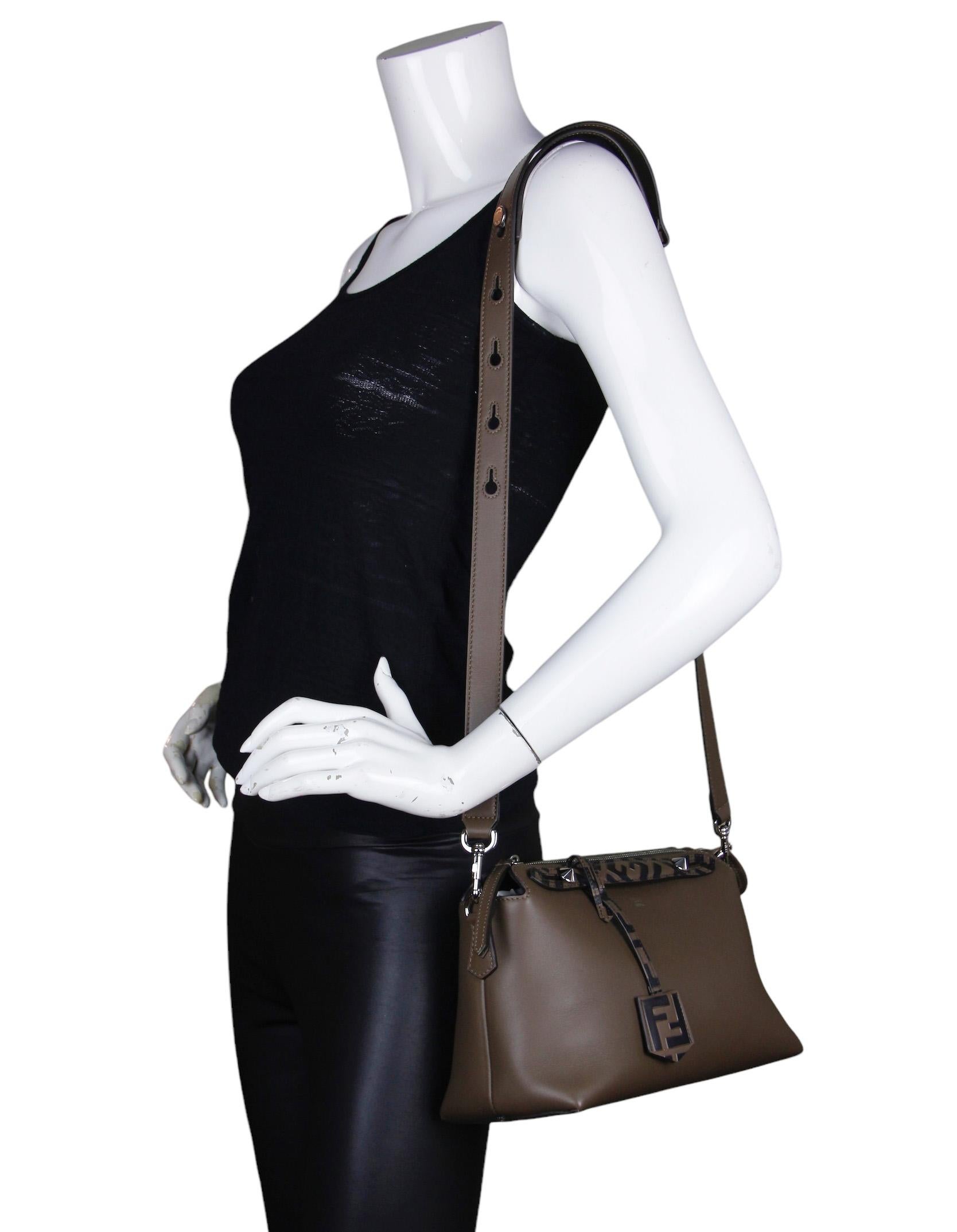 Fendi Brown Leather Monogram By The Way Medium Boston Bag.  Features optional shoulder/crossbody strap.

Made In: Italy
Color: Brown
Hardware: Silvertone
Materials: Leather 
Lining: Canvas
Closure/Opening: Zip top
Exterior Pockets: None
Interior
