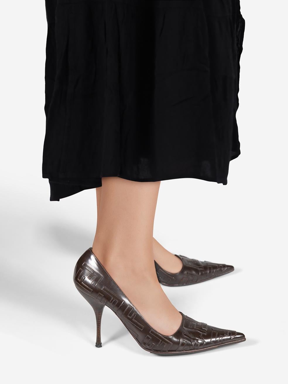 CONDITION is Very good. Minimal wear to the heels is evident. Small scratches across all areas of the leather and heel on both shoes. General creasing to the leather on the toe box of both shoes on this used Fendi designer resale item. Please note