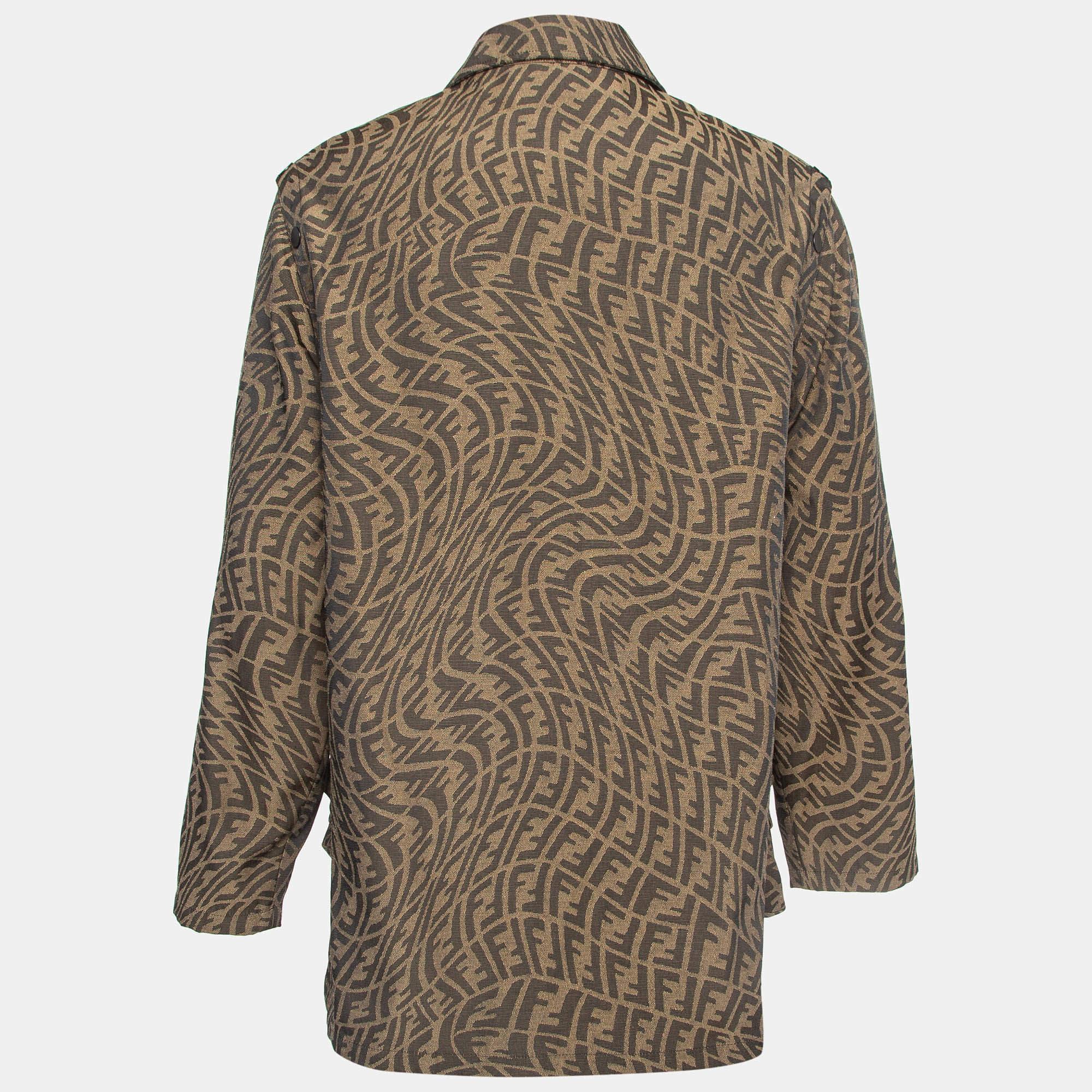 Wrap yourself in the timeless allure of the Fendi convertible jacket. Crafted with exquisite attention to detail, this jacket seamlessly blends luxury and functionality. Its rich brown hue, adorned with Fendi's iconic logo jacquard, exudes