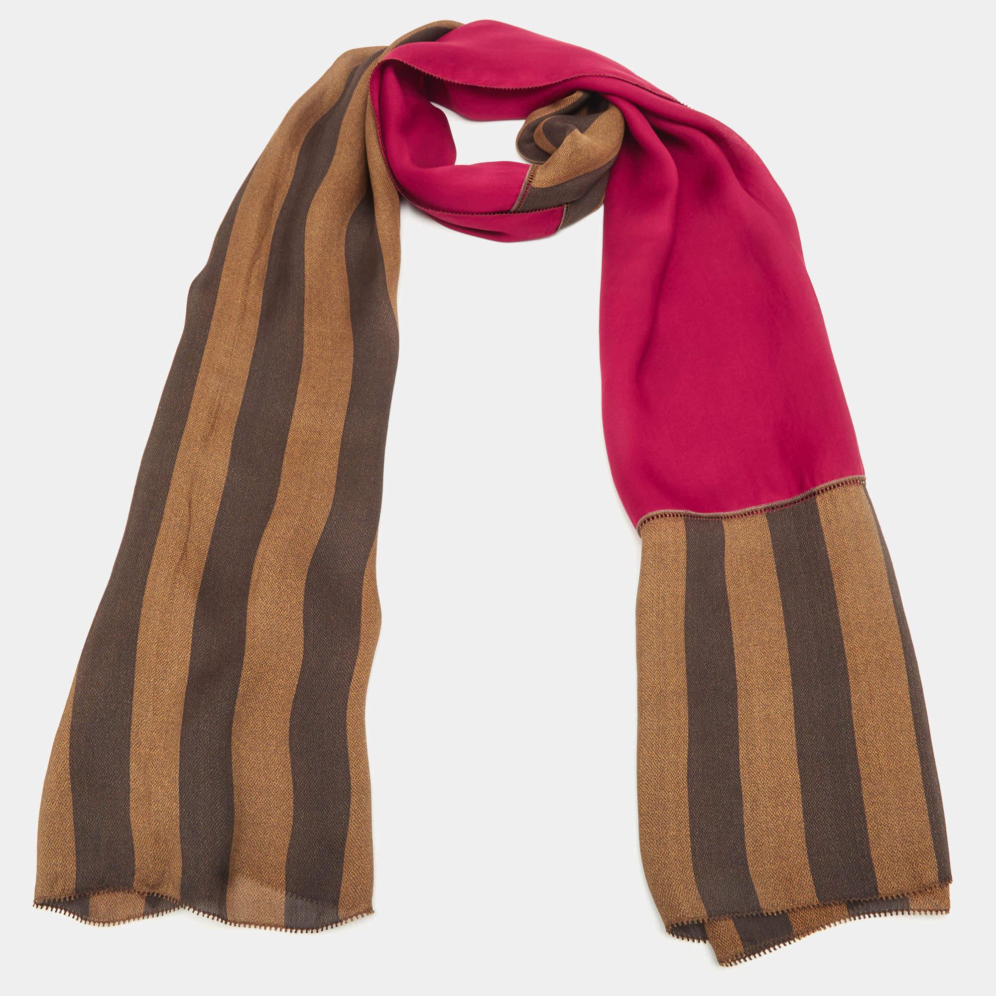 Pick this scarf for an instantly chic update. The scarf is made from silk and cut to a length that allows you to comfortably wrap it around your neck. The design involves pequin stripes and neatly hemmed edges.

