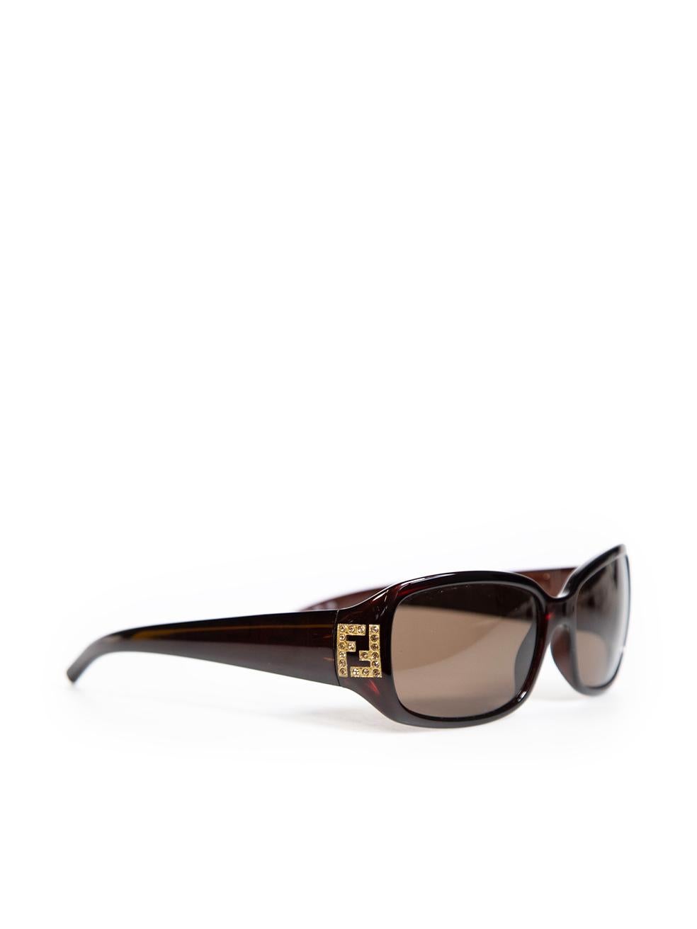 CONDITION is Good. General wear to sunglasses is evident, there are light scratches on the lens of this used Fendi designer resale item. This item comes in the original box.
 
 
 
 Details
 
 
 Brown
 
 Acetate
 
 Rectangle sunglasses
 
 Crystal FF