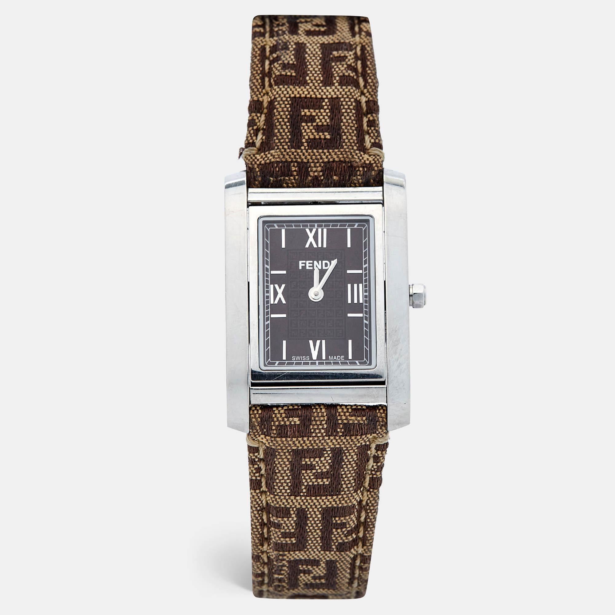 Crafted for the discerning woman, the Fendi watch exudes timeless charm and understated luxury. Its sleek brown canvas strap perfectly complements the gold-plated stainless steel case, enhancing its durability and style. With precise quartz