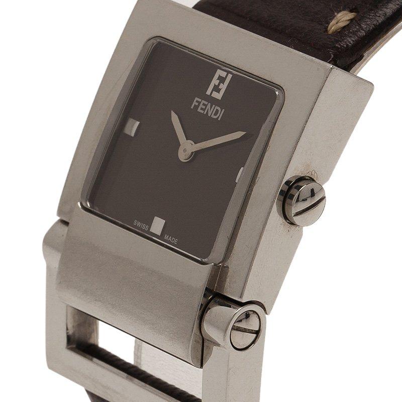 A stylish timepiece from Fendi to keep up with time! Made from stainless steel, its signature rectangular Fendi logo shaped case holds the silver bezel. The brown dial features Fendi's logo and silver-tone hands. Its leather strap is detailed with