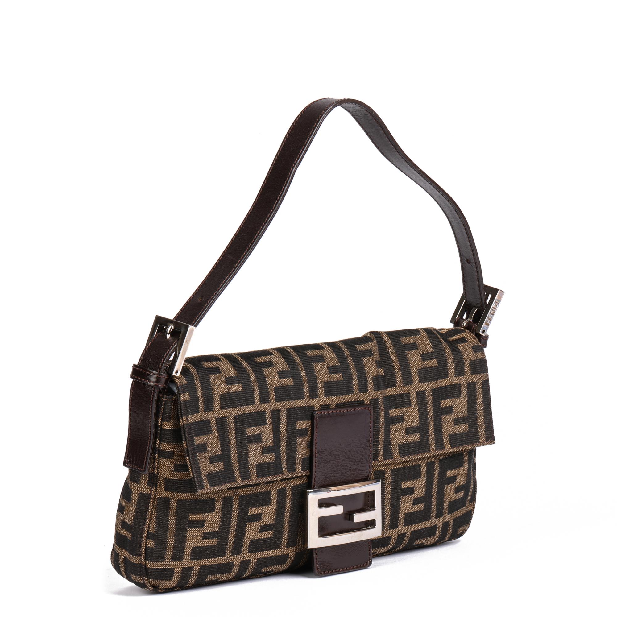 FENDI
Brown Zucca Canvas & Calfskin Leather Vintage Baguette

Xupes Reference: HB4662
Serial Number: Unreadable
Age (Circa): 2000
Authenticity Details: Serial Stamp (Made in Italy)
Gender: Ladies
Type: Shoulder

Colour: Brown
Hardware: