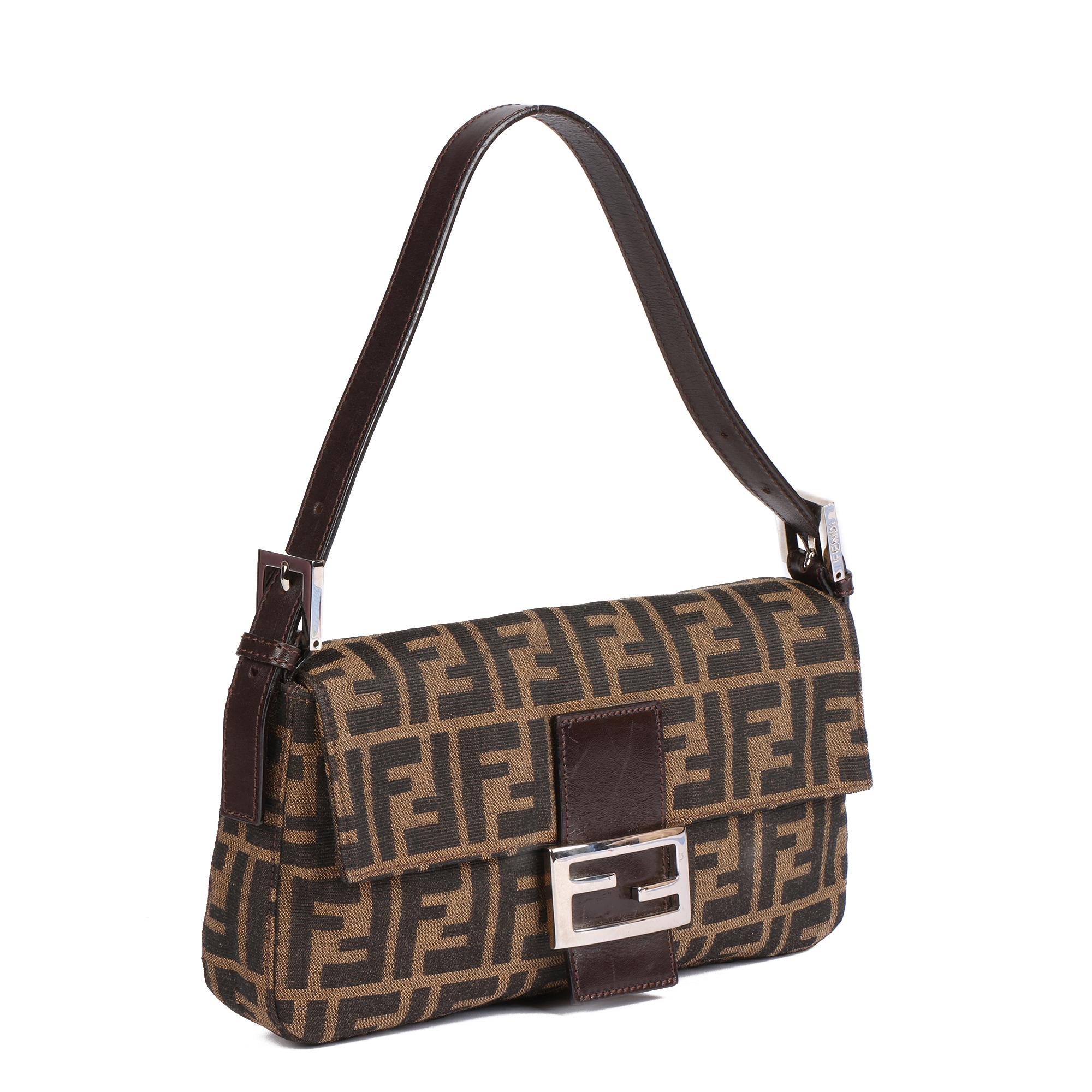 FENDI
Brown Zucca Canvas & Calfskin Leather Vintage Baguette

Xupes Reference: HB4663
Serial Number: 2305 26424 069
Age (Circa): 2000
Accompanied By: Fendi Dust Bag
Authenticity Details: Serial Stamp (Made in Italy)
Gender: Ladies
Type: