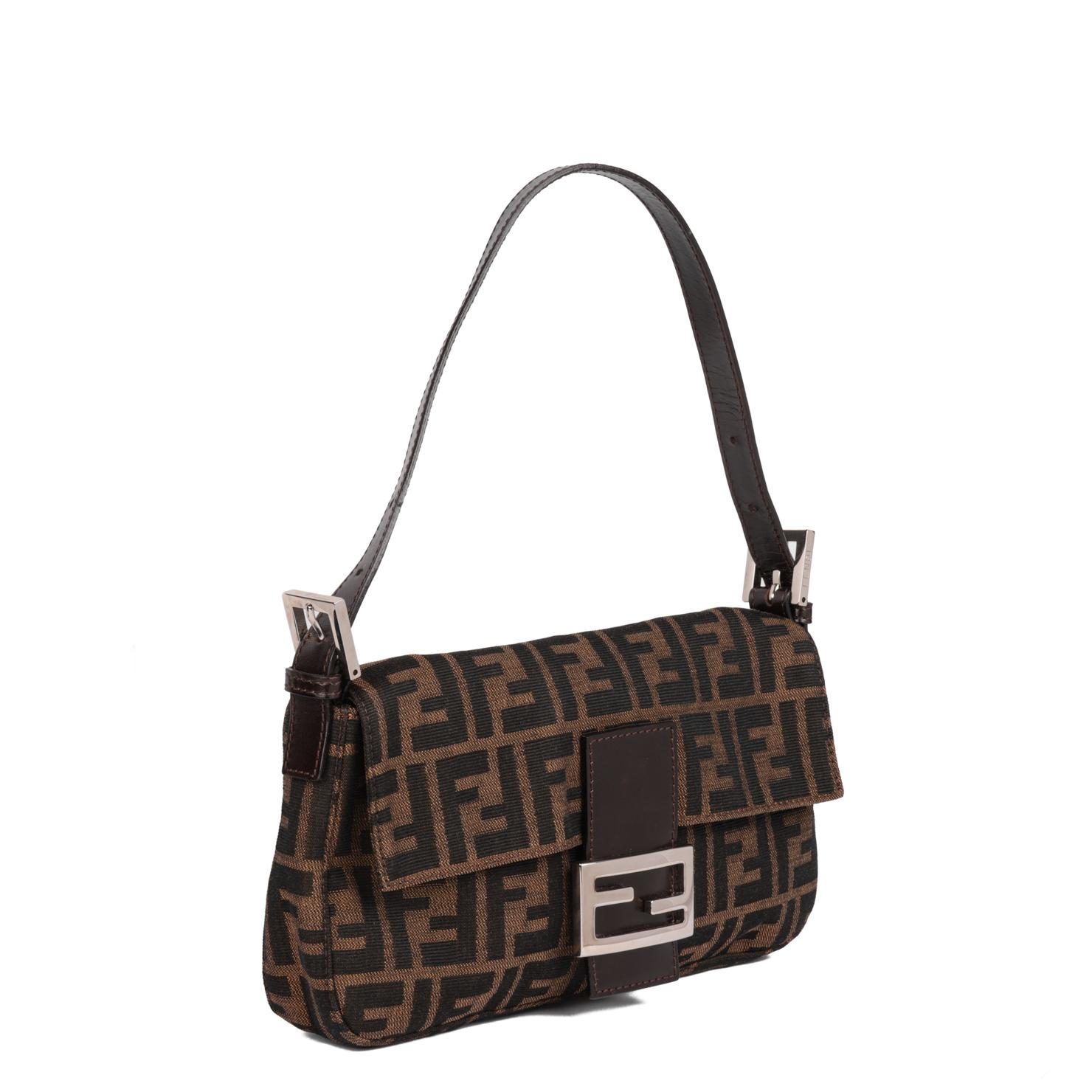 FENDI
Brown Zucca Canvas & Calfskin Leather Vintage Baguette

Xupes Reference: CB854
Serial Number: 2211 26424 99
Age (Circa): 2000
Authenticity Details: Date Stamp (Made in Italy)
Gender: Ladies
Type: Shoulder, Top Handle

Colour: Brown 
Hardware: