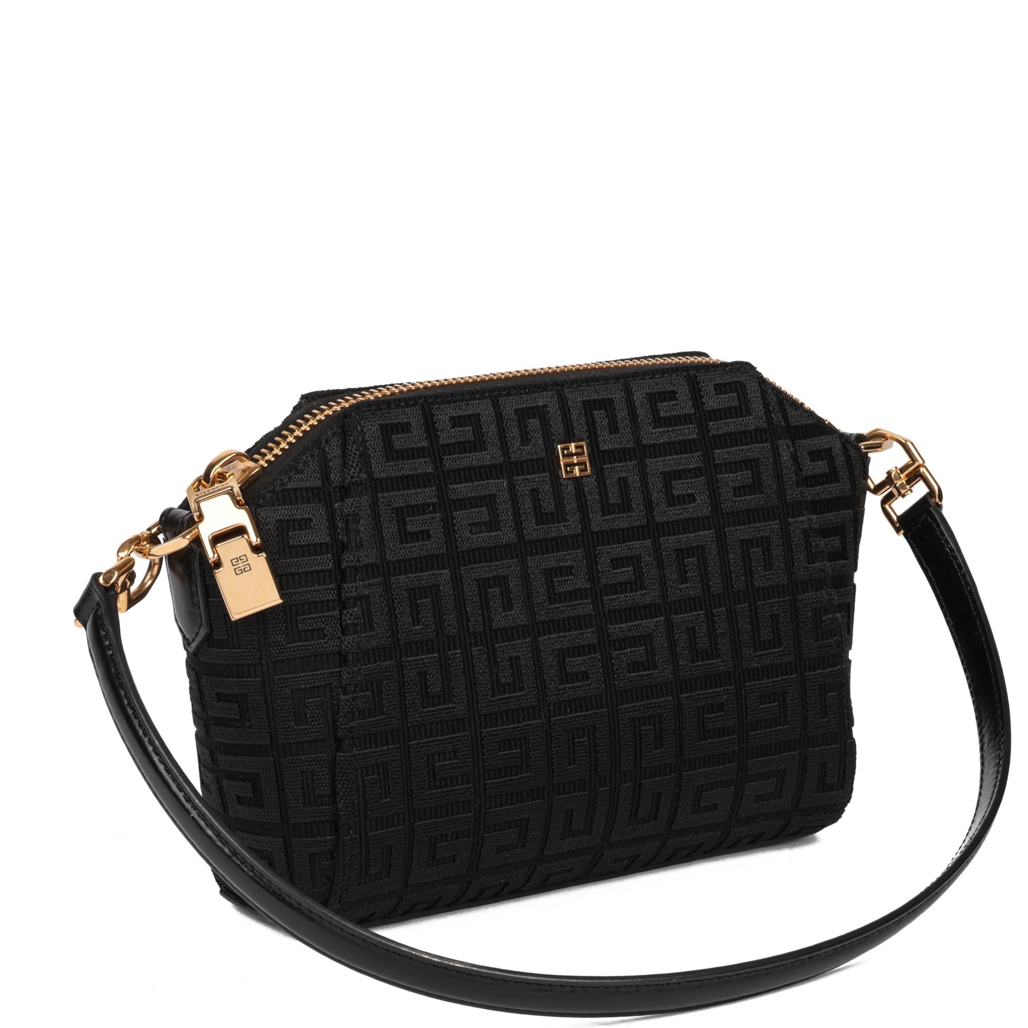 GIVENCHY
Black Canvas Antigona XS Bag

Xupes Reference: CB855
Serial Number: KU H 0291
Age (Circa): 2021
Accompanied By: Givenchy Dust Bag, Care Booklet, Tag, Fashionette Invoice
Authenticity Details: Date Stamp (Made in Italy)
Gender: Ladies
Type: