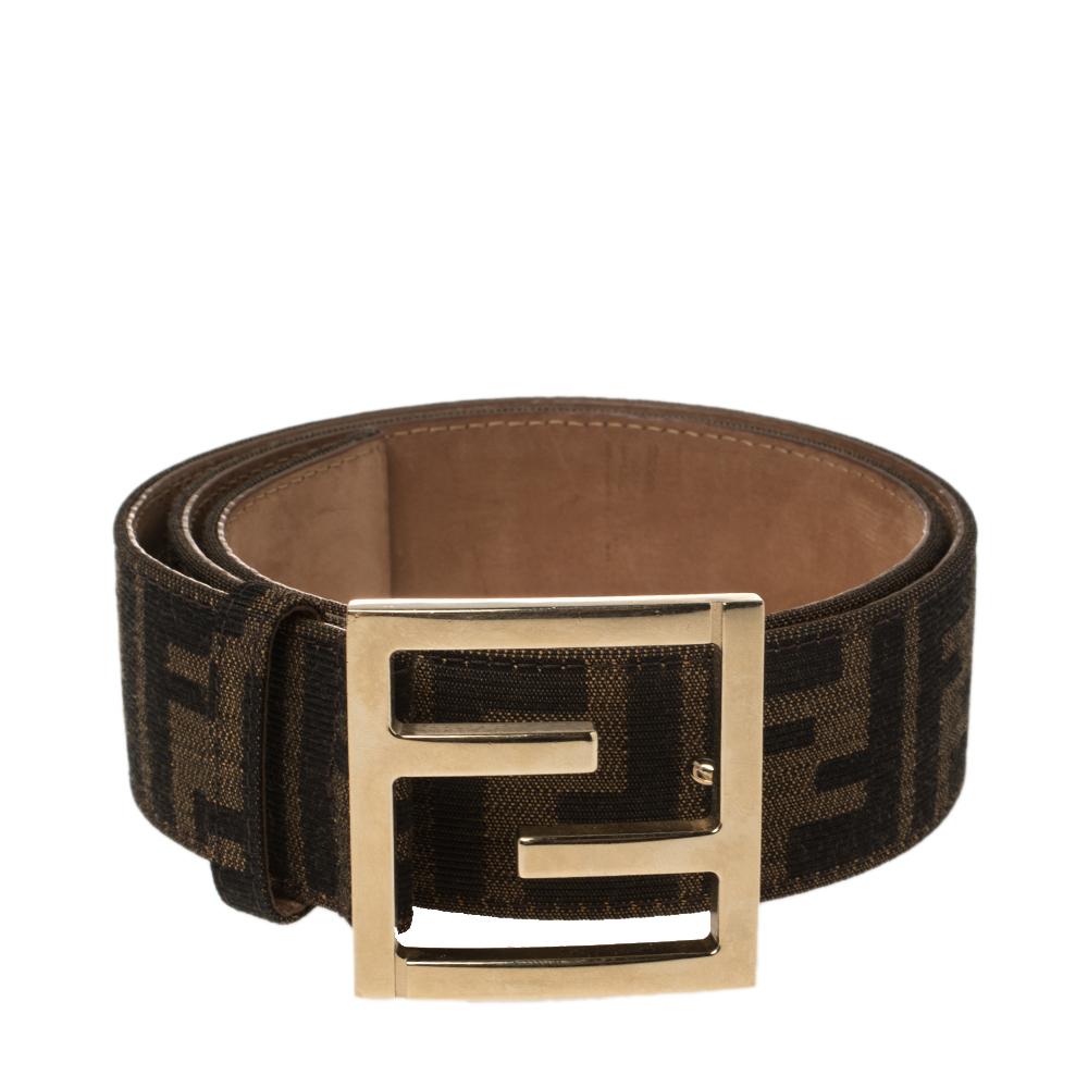 This chic and classy belt from Fendi will be an amazing buy! It is crafted from the signature Zucca canvas and styled with a gold-tone inverted 'FF' buckle and a loop that seamlessly fastens the belt.

