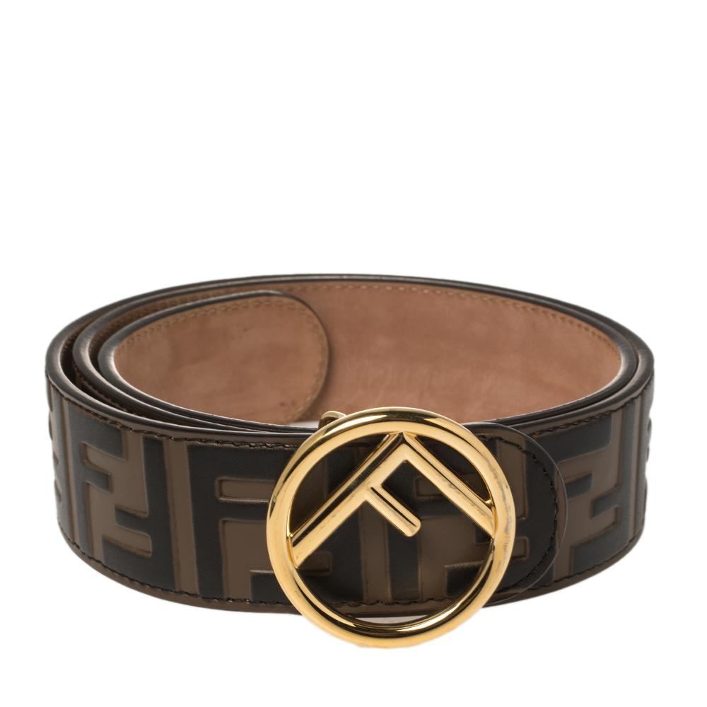 This chic and classy belt from Fendi will be an amazing buy! It is crafted from the signature Zucca embossed leather and styled with a gold-tone inverted 'FF' buckle and a loop that seamlessly fastens the belt.

