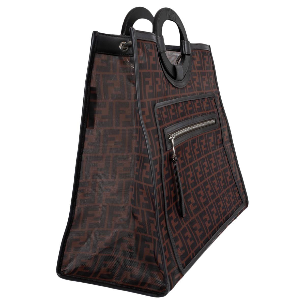 100% authentic Fendi Runaway shopping tote bag in dark brown and cognac brown mesh featuring dark brown leather tim and handles. The design features a zipper front pocket and is unlined. Has been carried and shows a tiny lighter dot on the front and