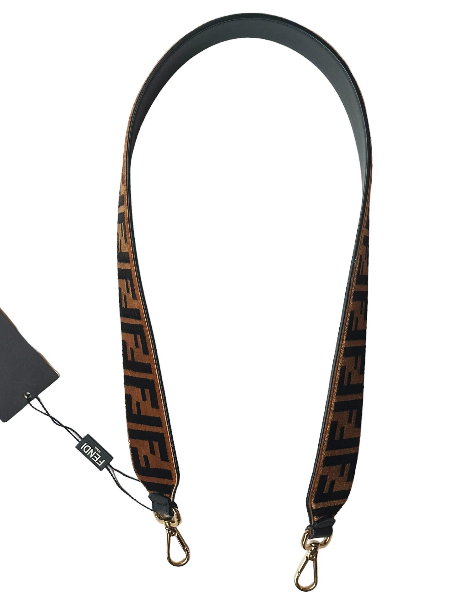 Fendi Brown Zucca Monogram Textured Velvet Strap You

Made In: Italy
Year of Production: 2020-2023
Color:  Brown
Hardware: Goldtone
Materials: 100%calf leather, 95%polyester,5%resin, embroidery:100%viscose
Closure/Opening: Two hooks
Overall