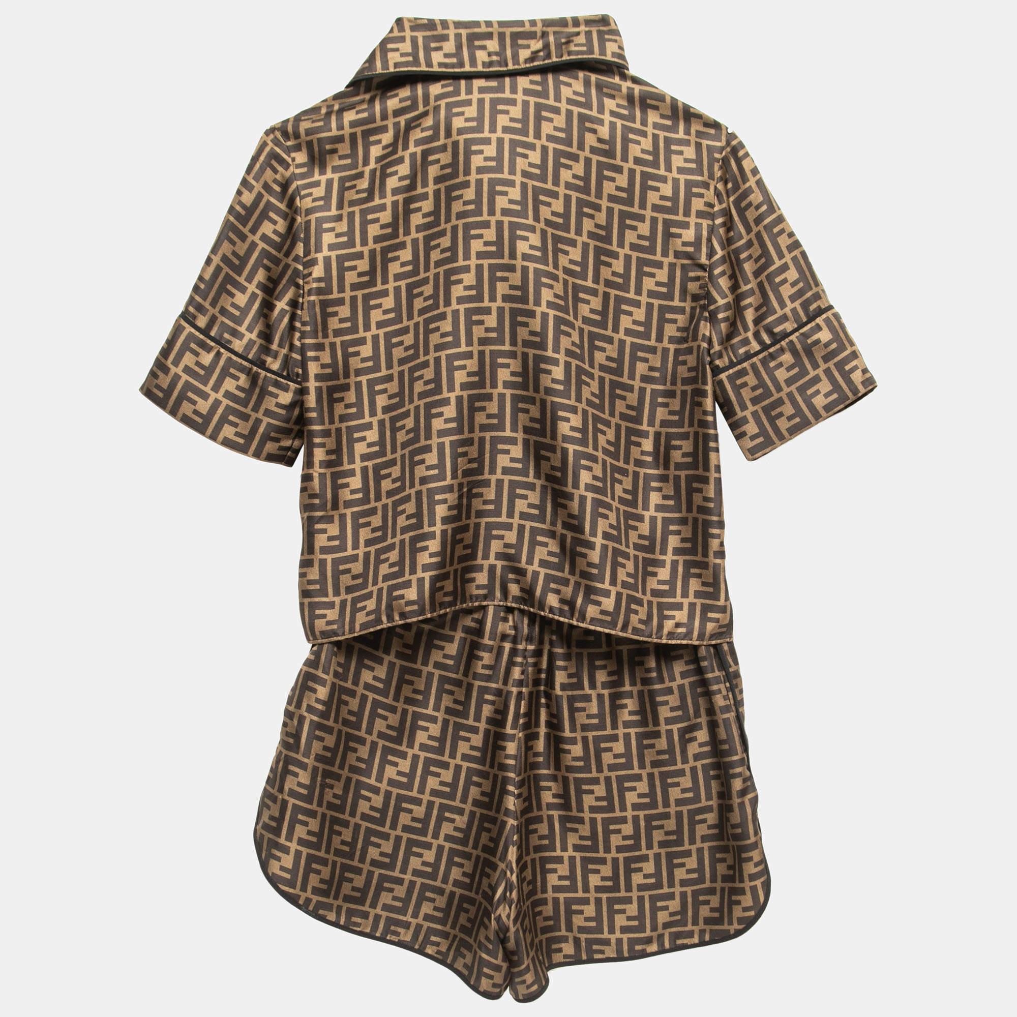 Fendi knows how to keep you comfortable and cozy with this top-pajama suit. Tailored using silk, this suit has the famous Zucca print all over it for a look of luxury.

