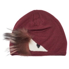 Fendi - Bonnet Monster Eye en laine bourgogne avec détails en fourrure (taille unique)