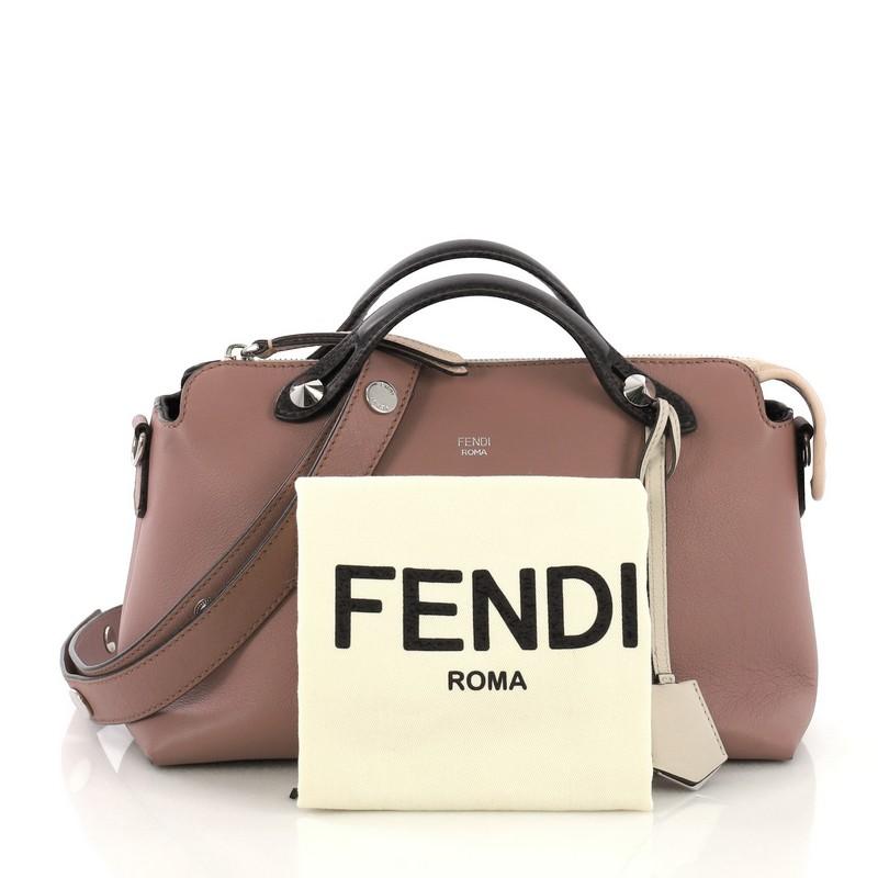 This Fendi By The Way Satchel Calfskin Small, crafted from dusty pink calfskin leather, features dual flat leather top handles, and silver-tone hardware. Its top zip closure opens to a brown fabric interior with slip pocket. 

Estimated Retail