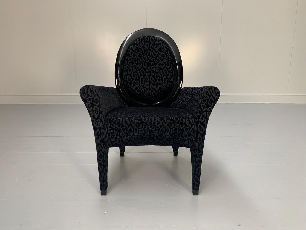 On offer on this occasion is a superb Fendi Casa Armchair, dressed in a luxurious, top-grade, embroidered, contemporary-motif fabric in Dark Grey and Black, and with Glossy-Black lacquered framework.

As you will no doubt be aware by your interest