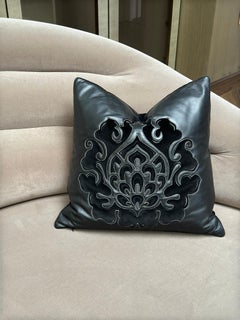 Cuscino Fendi Casa, intarsio di pelle nera e camoscio, motivo damascato, Italia, 2011