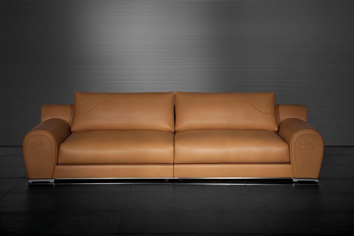 Double Varenne modular cognac saddle leather sofa from the iconic Italian fashion house of Fendi, featuring lush, buttery soft leather, quilted accents and embossed Fendi horses. Stainless steel base, steel and wood frame, foam and down fill and the
